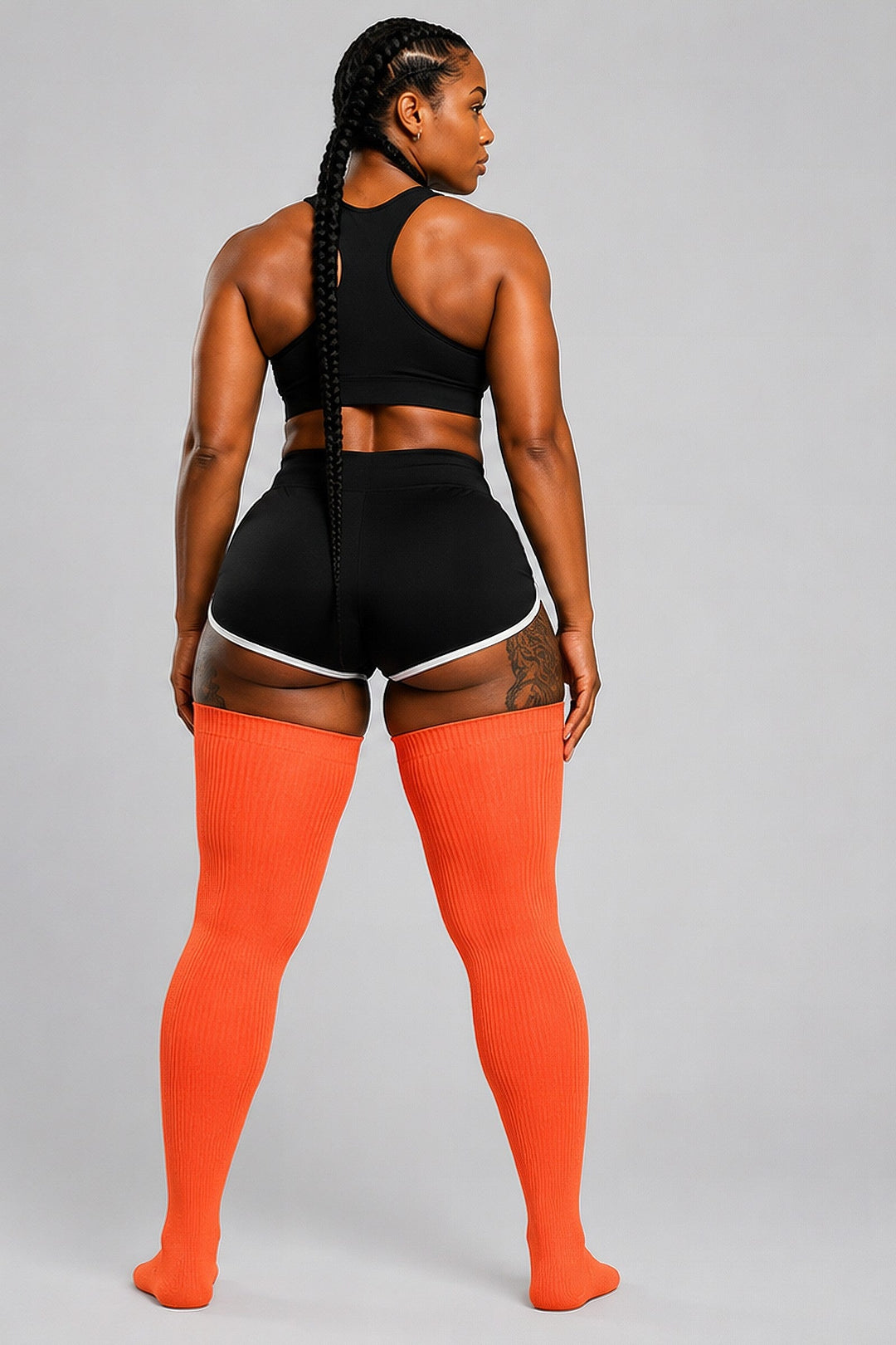 Plus size thigh high socks in warm sunset orange and pink tones