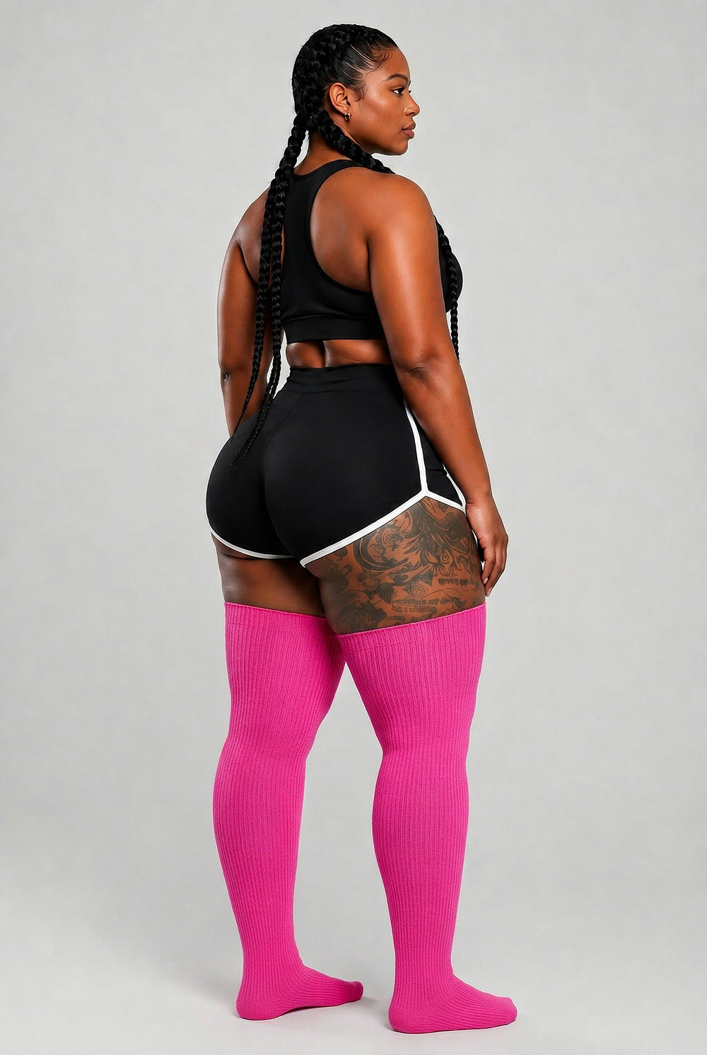 Plus size thigh high socks in bold fuchsia floral bloom pattern