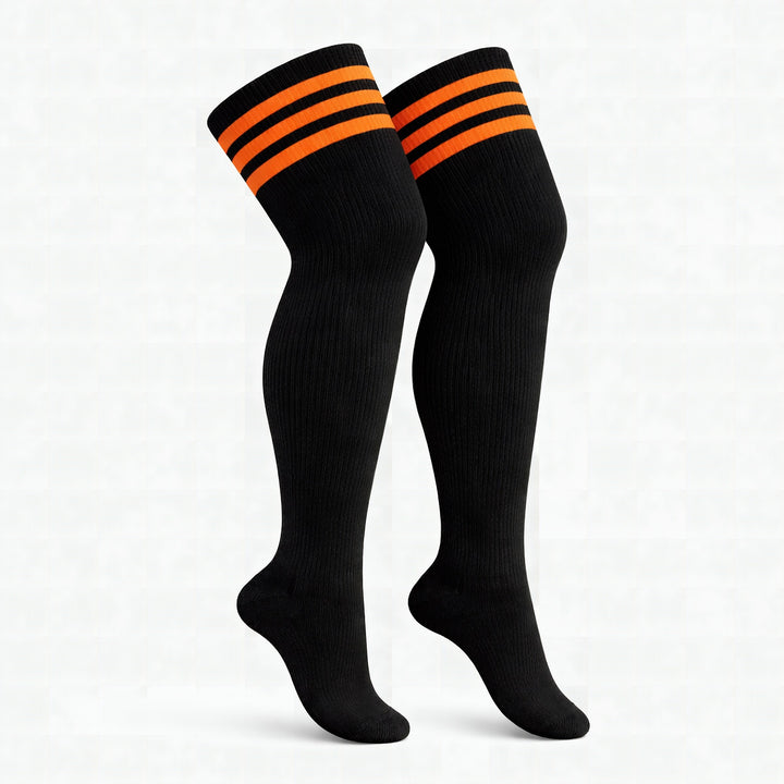 Plus size thigh high socks in black and orange pumpkin stripes