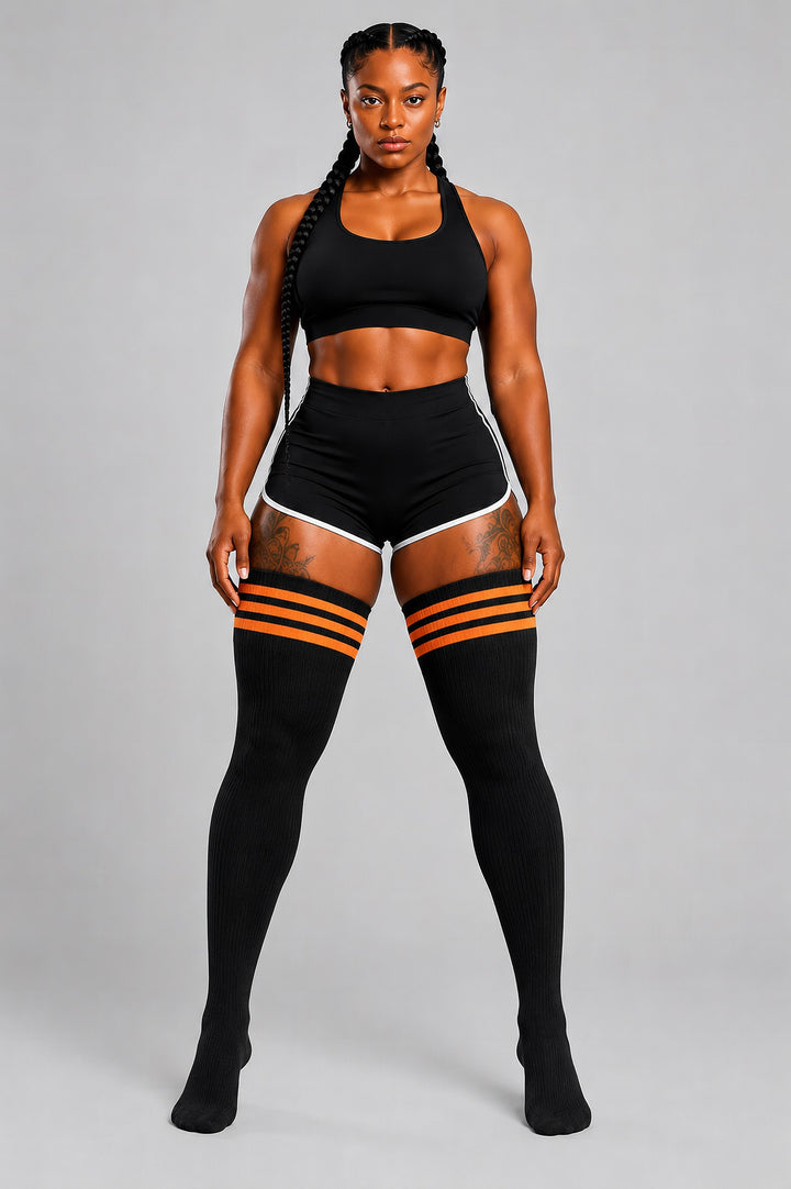Plus size thigh high socks in black and orange pumpkin stripes