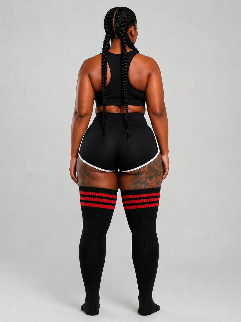 Plus size thigh high socks in black and dark striped pattern