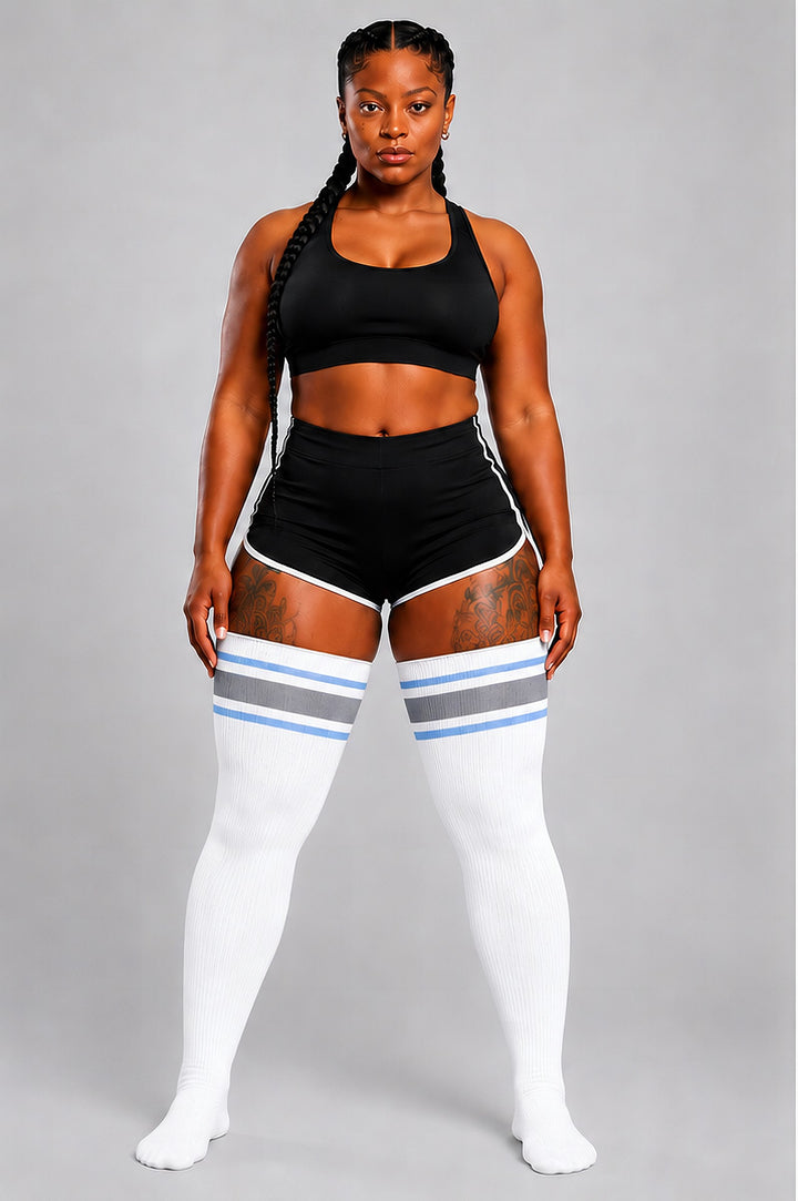 Plus size thigh high socks in white with snowflake pattern