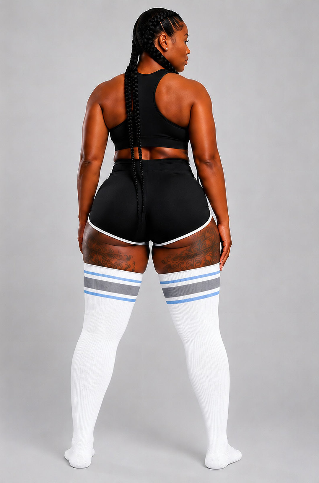 Plus size thigh high socks in white with snowflake pattern