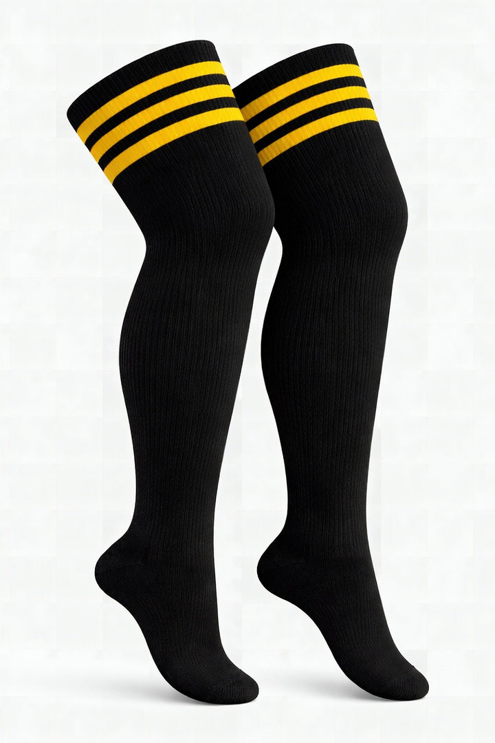 Plus size thigh high socks in sunset gradient of orange, pink, and purple