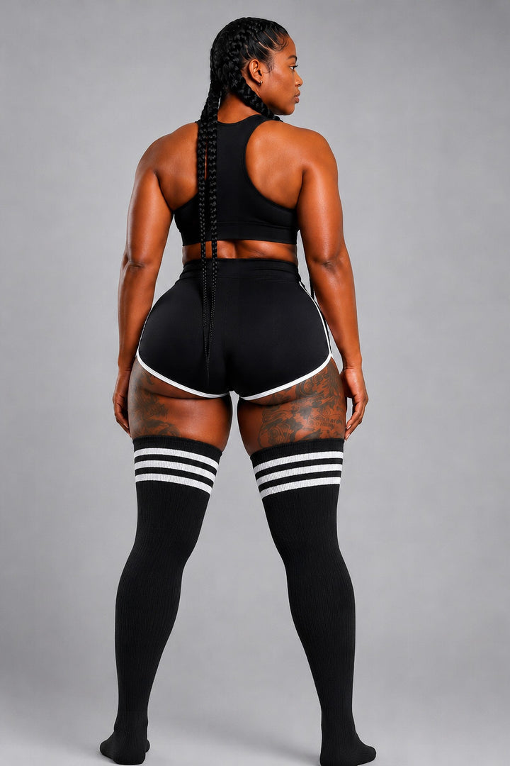 Black plus size thigh high socks with white horizontal stripes