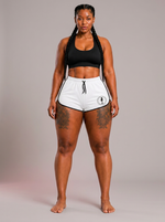 White Performance Flex Shorts on model